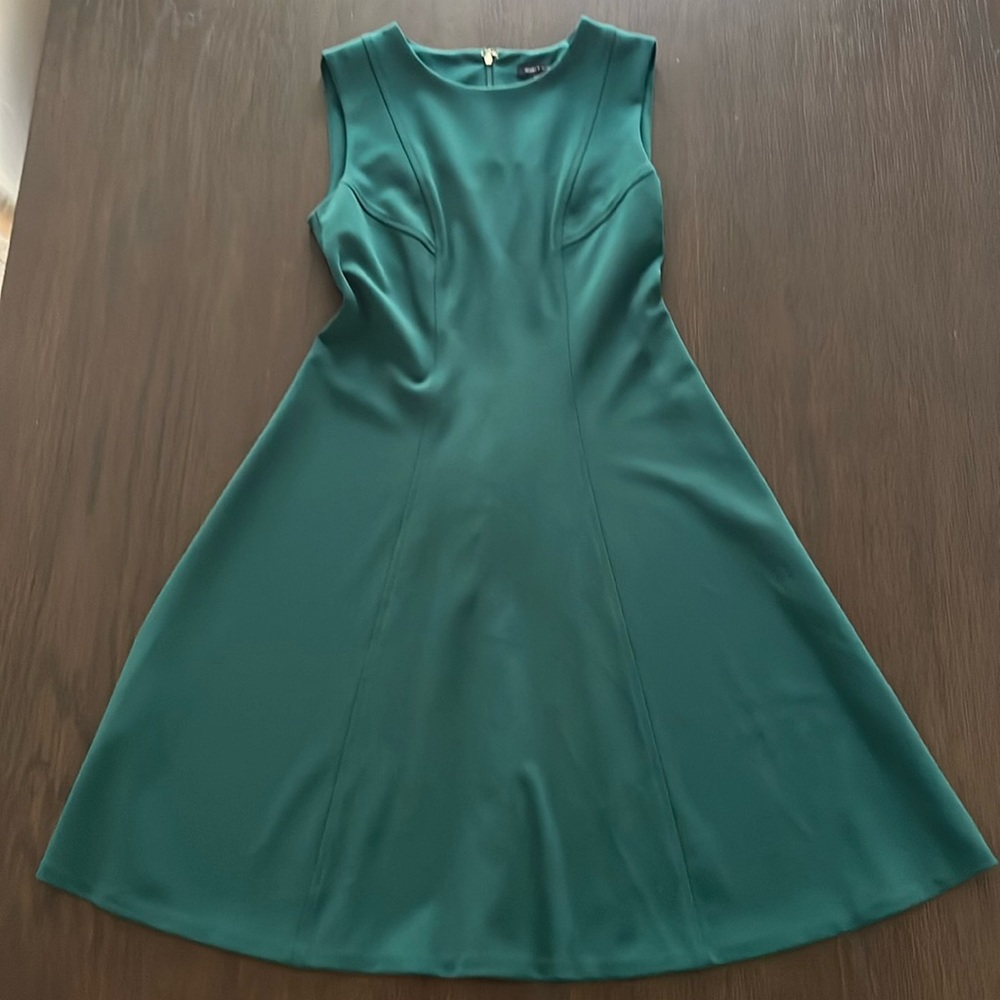 Green A-line dress. Size 6. Back zip. Gently worn.